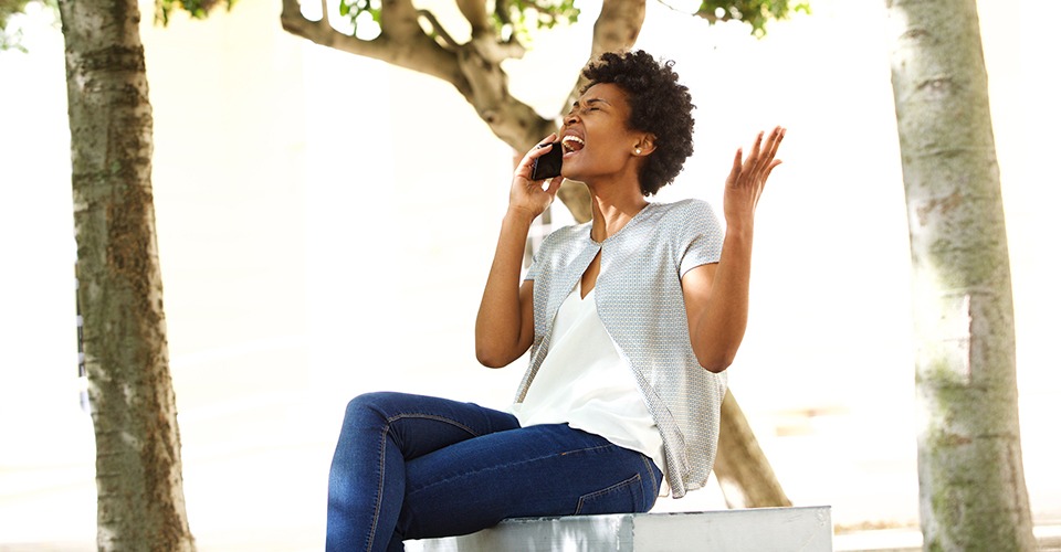 woman upset on the phone