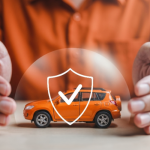 A man protecting his car with an extended car warranty