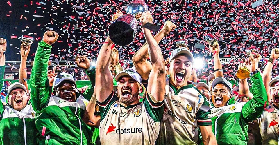 Dotsure SWD Eagles team holding up the Carling Currie Cup First Division trophy after winning.